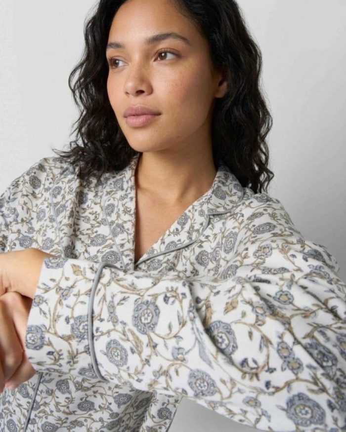 Women wearing classic grey blue floral viscose long pyjama set with button.