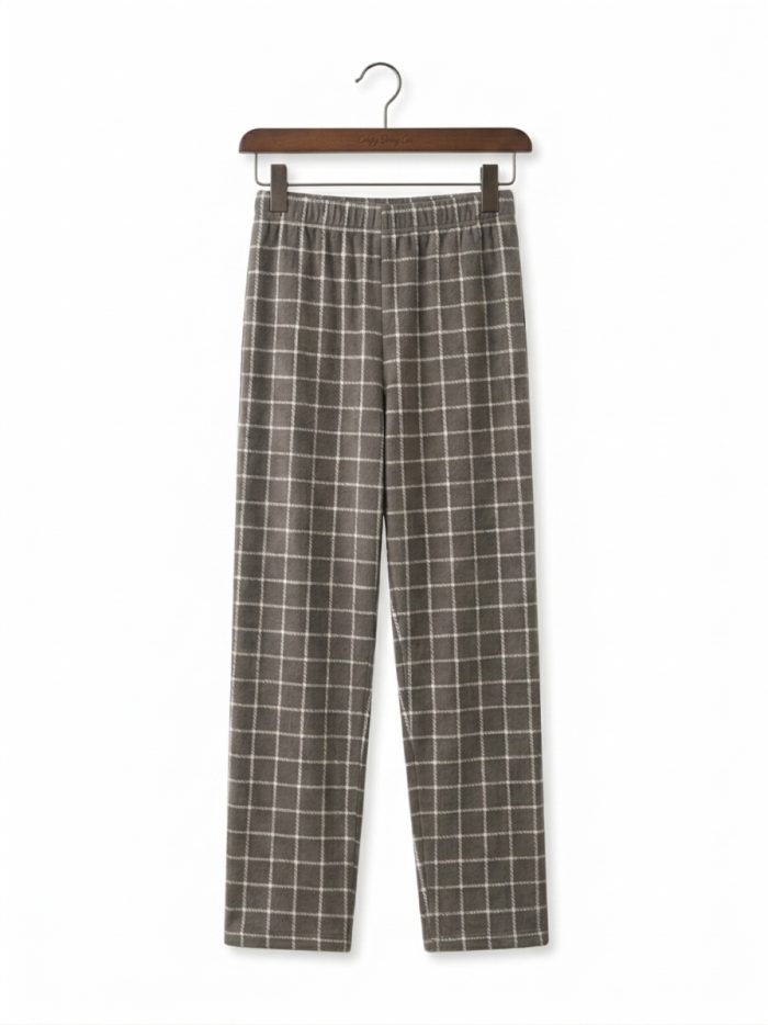Women's fleece pajama set with dusty mauve full-sleeve sweatshirt and gray-brown checkered pants.