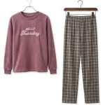 Women's fleece pajama set with dusty mauve full-sleeve sweatshirt and gray-brown checkered pants.