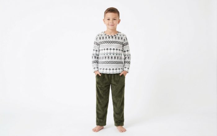 A baby boy is wearing the Fleece Fabric set by Freeland Galleria.