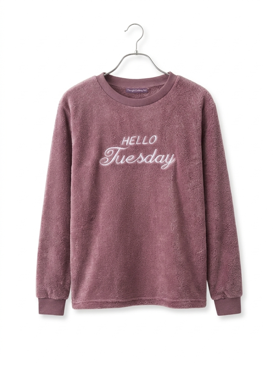 Women's fleece pajama set with dusty mauve full-sleeve sweatshirt and gray-brown checkered pants.
